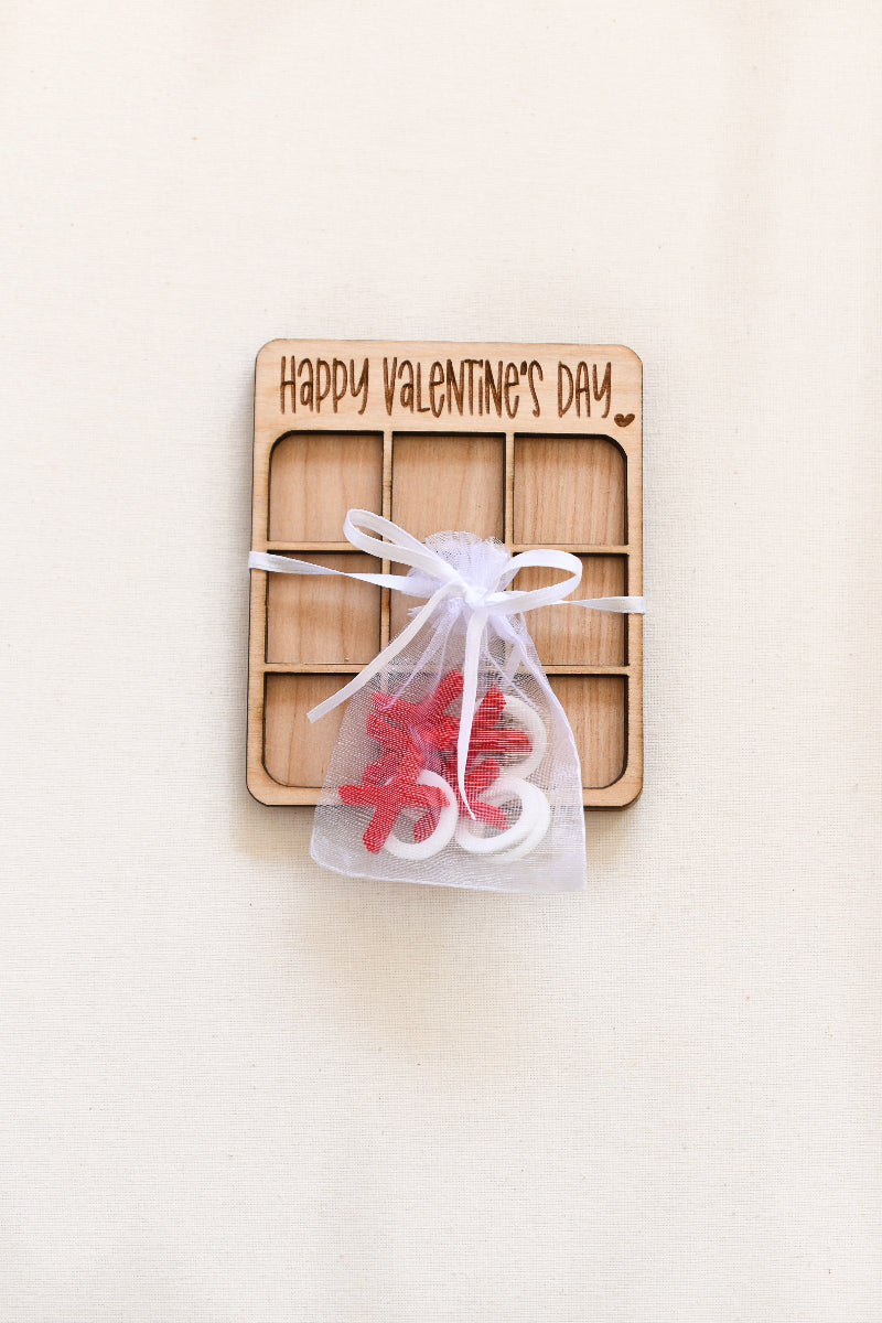 Custom personalized wood Tic Tac Toe boards, with acrylic red X's and white o's. Perfect for children’s class Valentines, parties, or a gift.