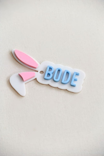 Custom easter Bunny ear gift/ basket tag. custom name in your choice of pink, blue, or green, with soft light pink-filled ears for a sweet and festive look.